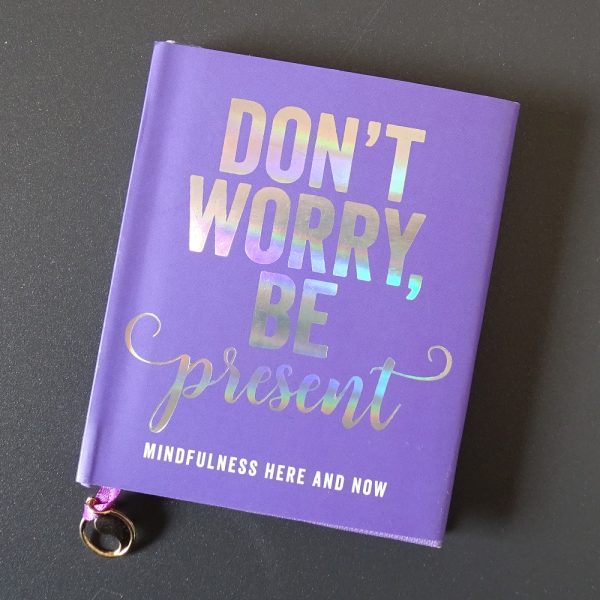 Book titled - Don't worry be present